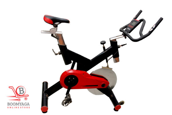 Commercial spinning bike with heavy-duty steel frame, adjustable resistance, LCD monitor, and ergonomic design for gym and home indoor cycling workouts.